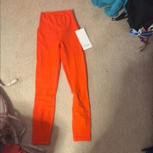 Brandnew lululemon Orange Leggings size 2